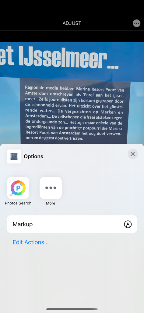 iOS photo menu showing the Photos Search Text extension icon for OCR extraction