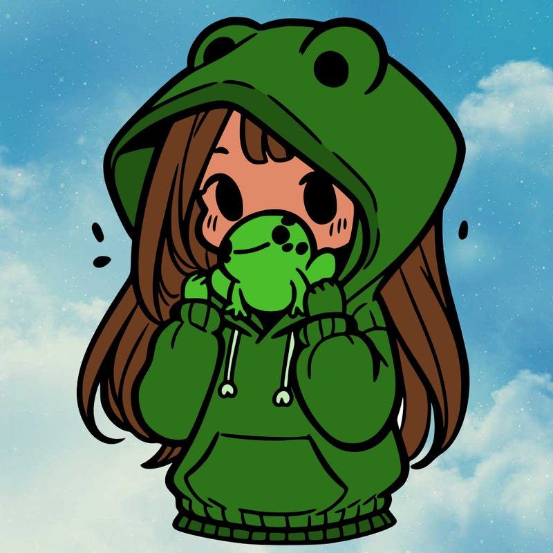 a girl holding a froggy hoodie