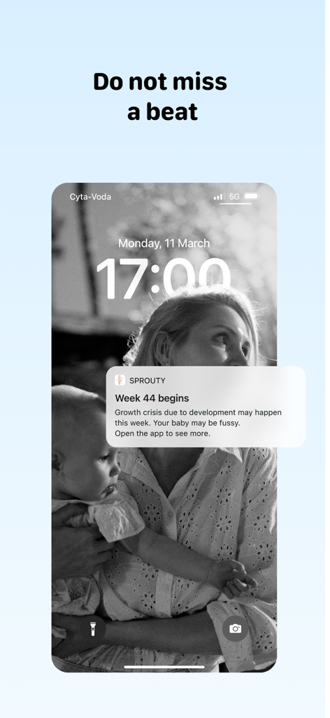 Baby Milestone Tracker Sprouty - iPhoneのロック画面に、生後44週の赤ちゃんの成長危機に関するSproutyアプリの通知が表示されている様子