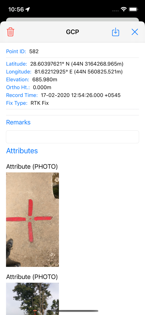 SW Maps - Detailed view of a ground control point in SW Maps showing coordinates and a photo of the physical survey marker