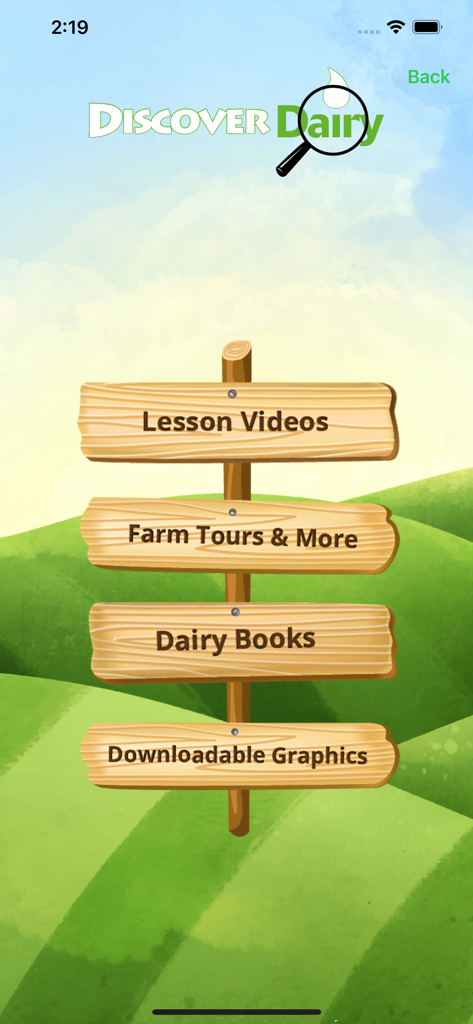 Main menu of the Discover Dairy app featuring educational links on a wooden signpost over green hills