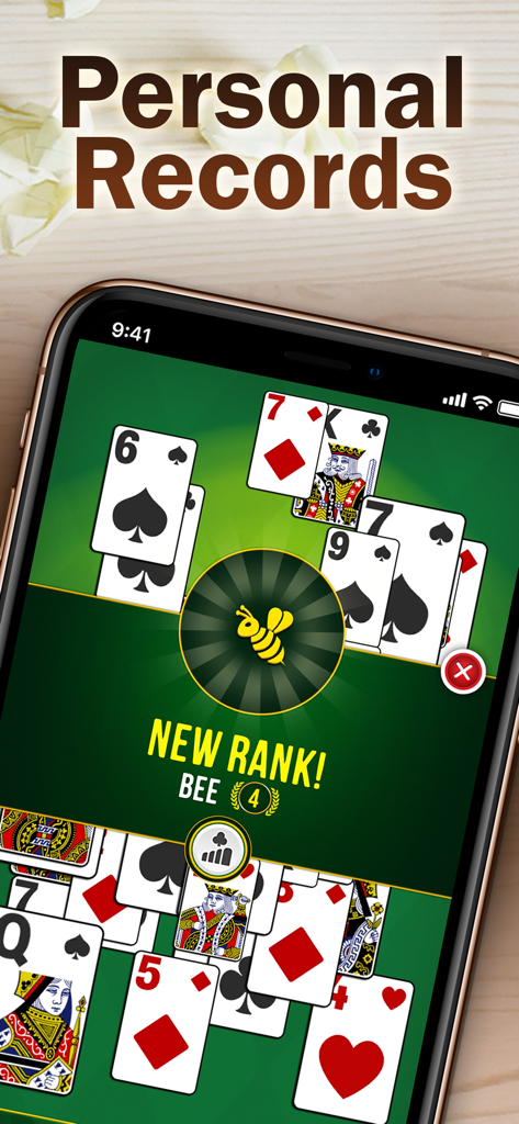 Solitaire Bliss Collection screen displaying a new Bee rank achievement under personal records.