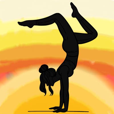 a woman doing a handstand