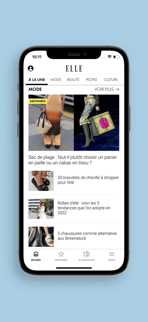 Smartphone screen showing the fashion section of the ELLE magazine app with summer trend articles.