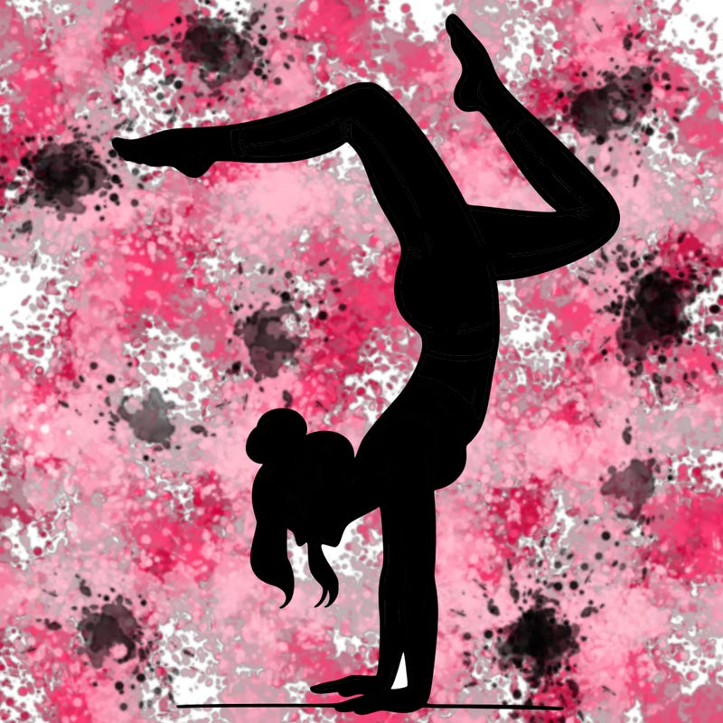 a woman doing a handstand