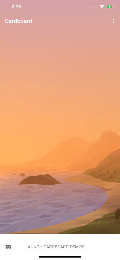 Google Cardboard app main screen showing a low poly sunset landscape over a coastline with a button to launch demos