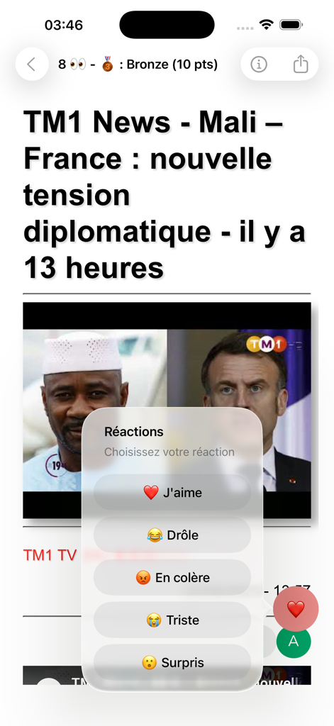 Un artículo de noticias en la aplicación Actu Mali con un menú emergente para reacciones de los usuarios como amor y sorpresa