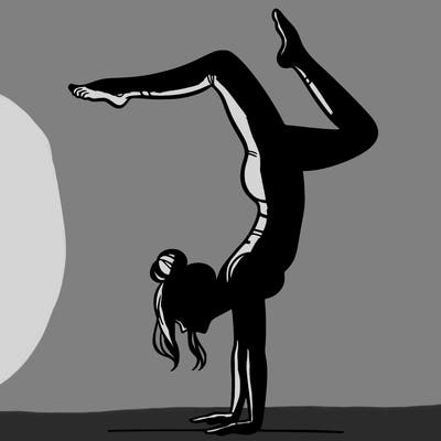 a woman doing a handstand