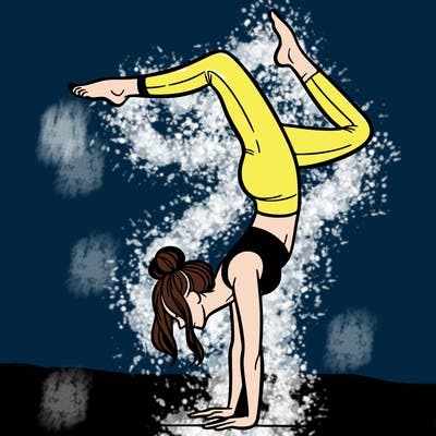 a woman doing a handstand