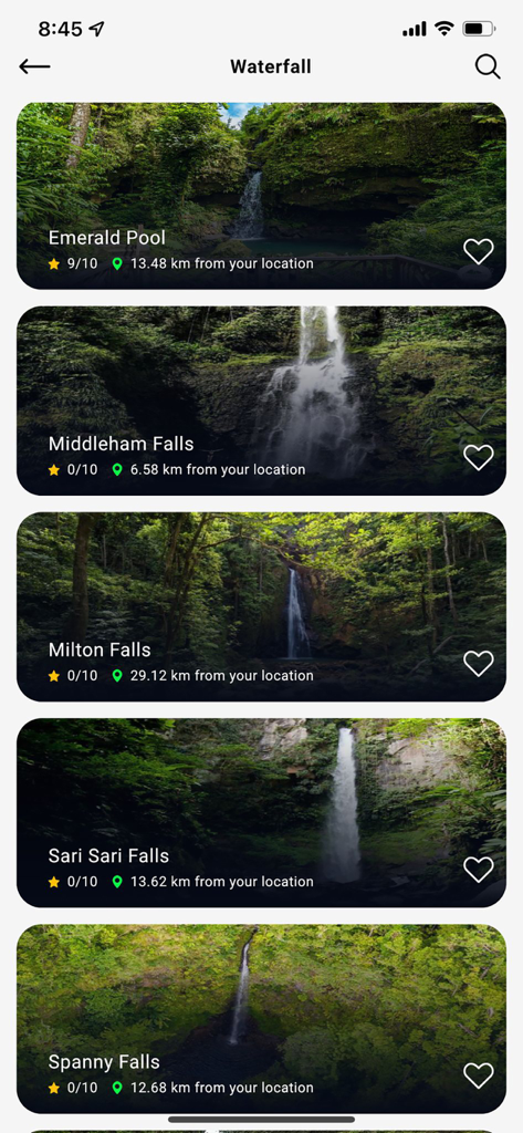 Explore Dominica - A mobile screen showing a list of waterfalls in Dominica including Emerald Pool and Middleham Falls with distances and ratings