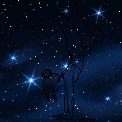 a woman doing a handstand