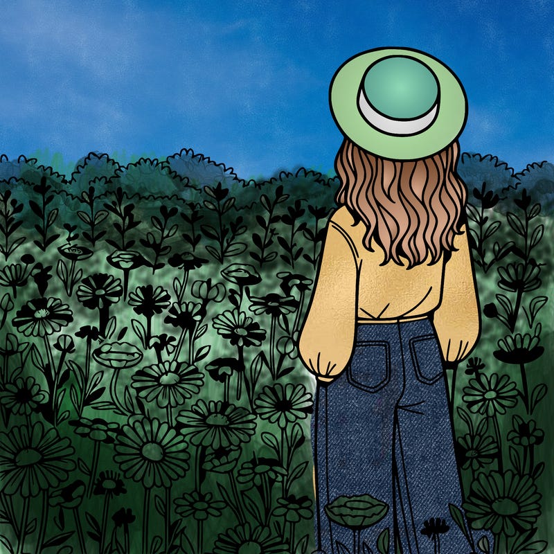 a woman in a field of flowers