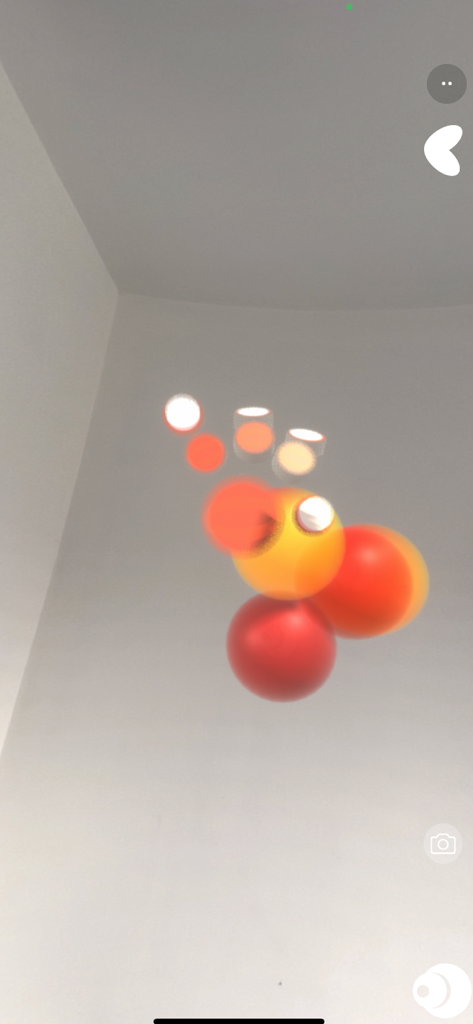 BOCLAA augmented reality music production interface with floating colorful spheres in a room