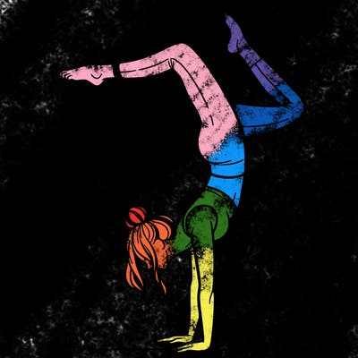 a woman doing a handstand