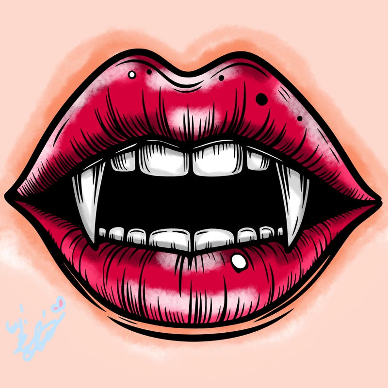 lips with vampire teeth