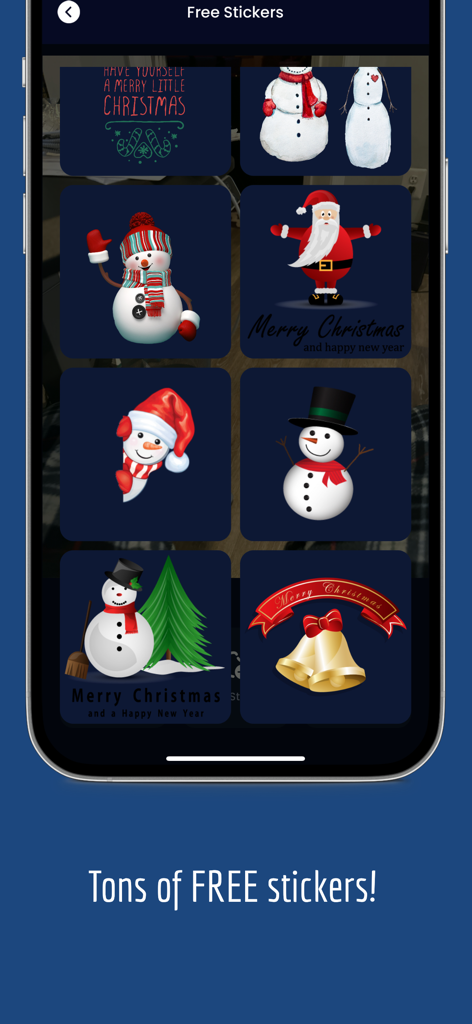 Catch Santa In My House! - A screen displaying various free Christmas stickers like snowmen, Santa Claus, and holiday bells for photo editing.