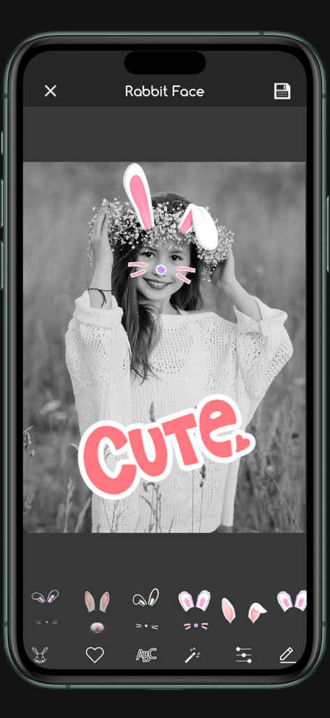 Animal Face changer funny pics - A girl using rabbit ear stickers and cute text in the Animal Face changer app.