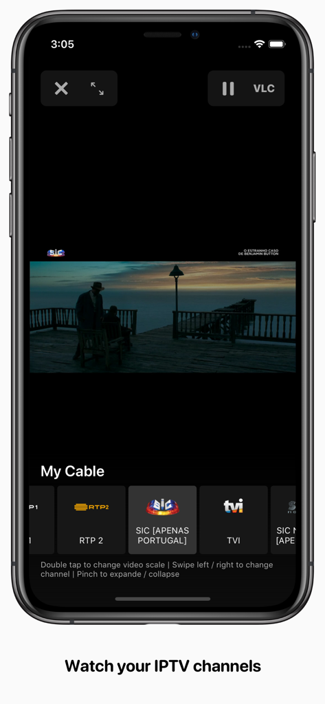 Feedlix TV app showing a video player with a movie streaming and a channel selection bar at the bottom.