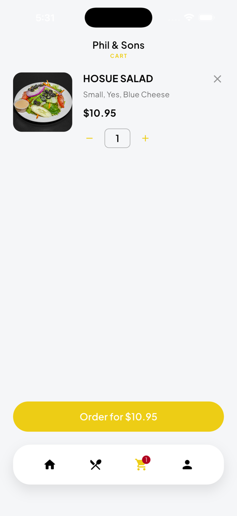 El carrito de compras de la aplicación móvil Phil and Sons que muestra una ensalada de la casa con aderezo de queso azul