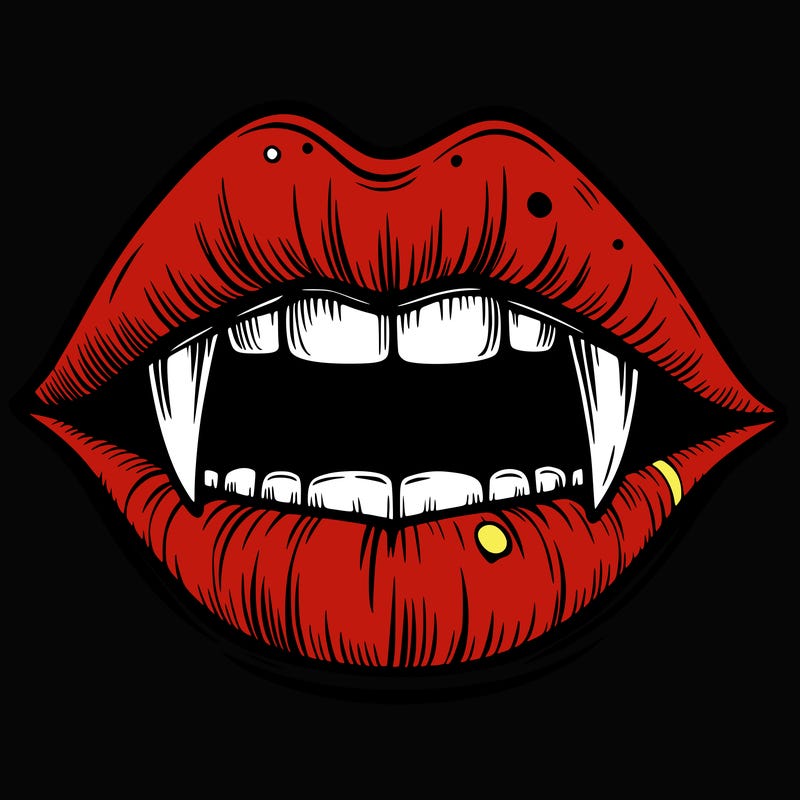 lips with vampire teeth