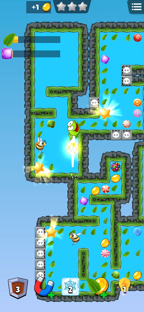 Ein grüner Charakter rennt durch ein Labyrinth mit Süßigkeiten-Thema, um Sterne und Süßigkeiten zu sammeln.