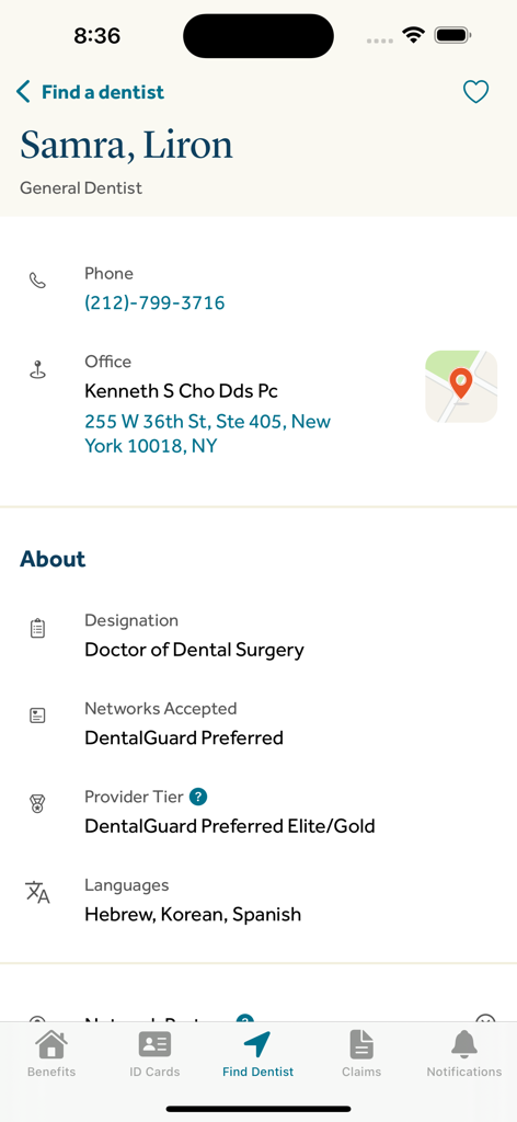 A dentist profile screen in the Guardian Dental and Vision app displaying contact information and accepted networks.