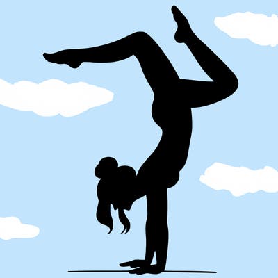 a woman doing a handstand