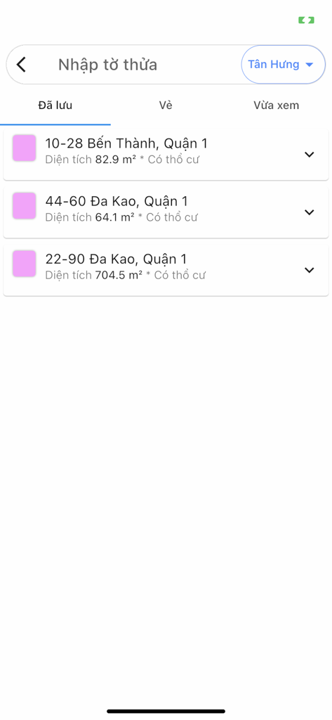 A list of saved real estate property records in Ho Chi Minh City displayed on the QH TP. HCM app interface.