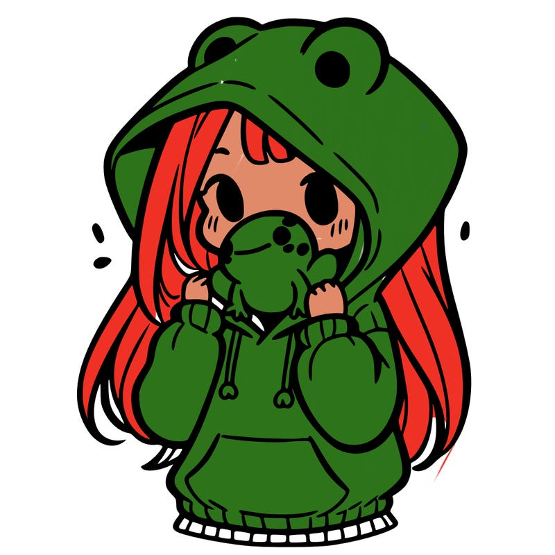 a girl holding a froggy hoodie