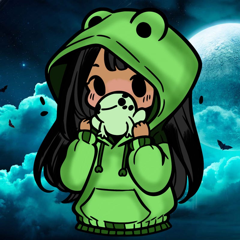 a girl holding a froggy hoodie