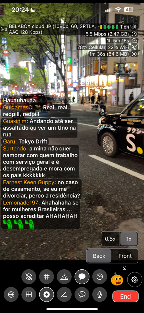 Moblin - Interface of the Moblin live streaming app showing a street scene at night with a real-time chat overlay and technical stream statistics