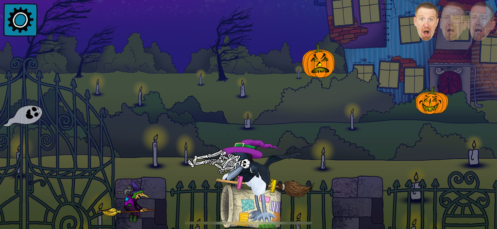 A cartoon graveyard scene from the Steve and Maggie Halloween app featuring Maggie the bird and various spooky characters