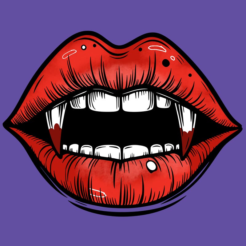 lips with vampire teeth