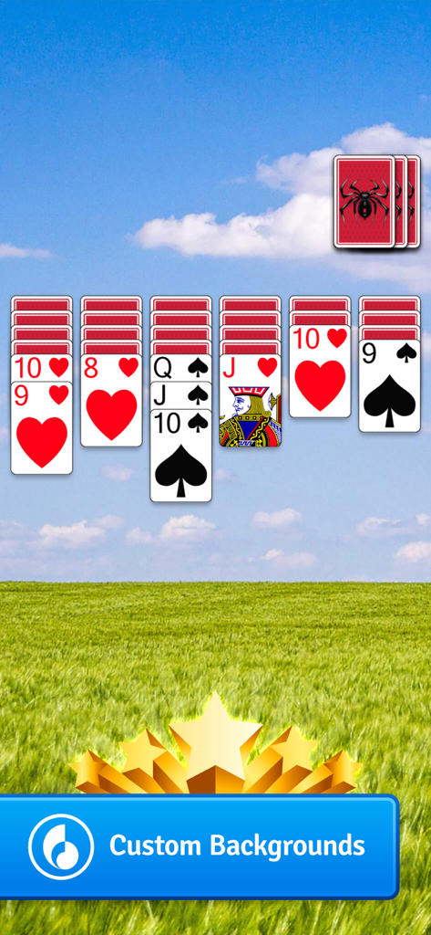 Spider Go Solitaire gameplay with a custom nature background featuring a green field and blue sky