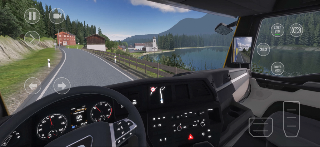 Vue intérieure du cockpit d'un camion roulant sur une route panoramique à côté d'un lac