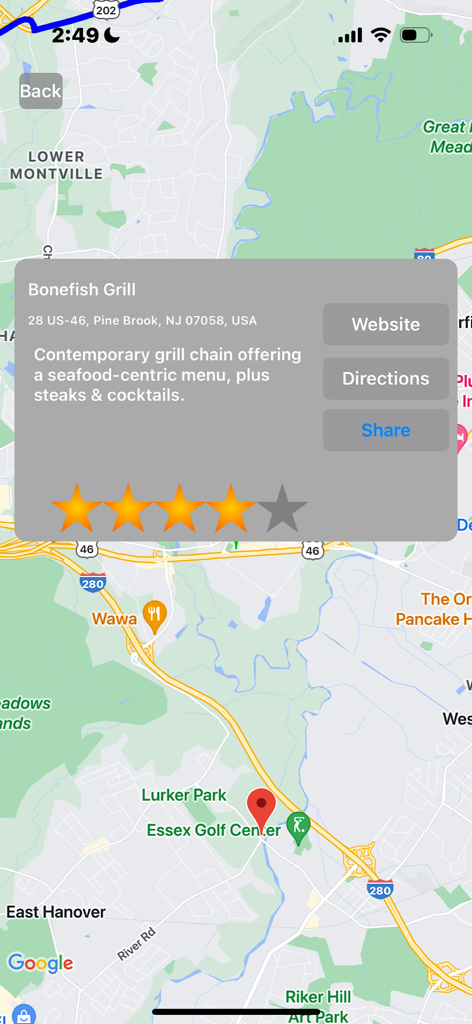 Map interface of Halfway Finder showing details for a seafood restaurant meeting point