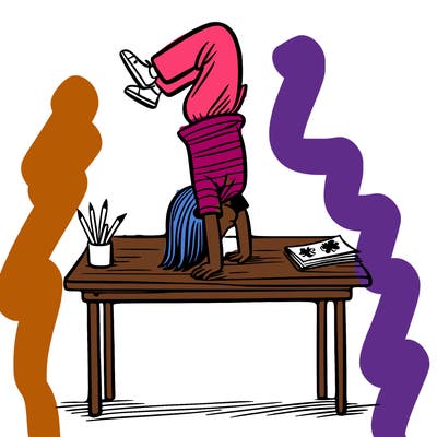 girl doing handstand on desk