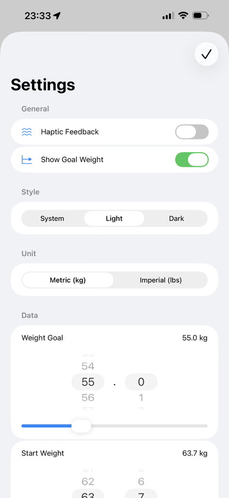 The settings screen of the EasyWeight app showing options for weight units, themes, and personal weight goals.