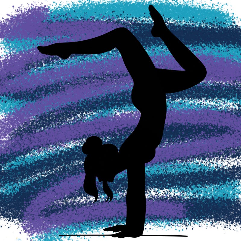 a woman doing a handstand