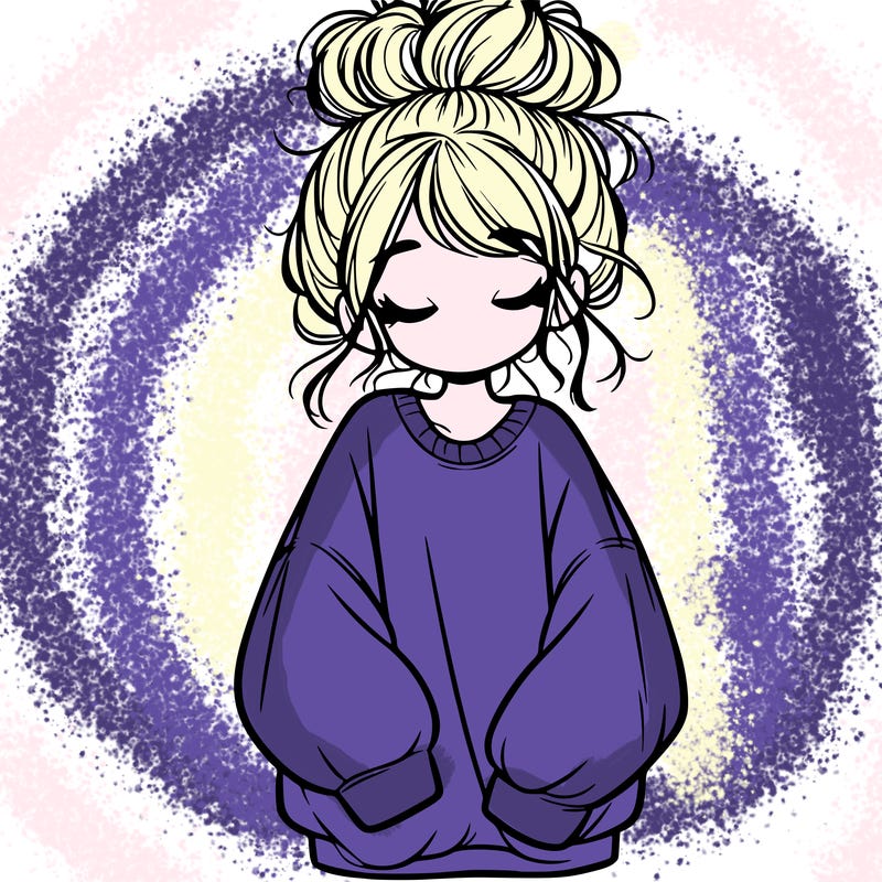 girl with baggy sweatshirt and messy bun