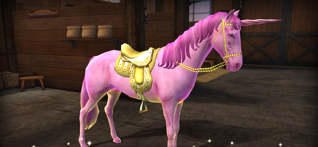 마구간에 있는 황금색 안장을 한 분홍색 유니콘