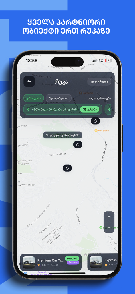 Interfaz de la app móvil de Marte mostrando un mapa con ubicaciones de servicios de coche cercanos y un banner de descuento para lavado de coches