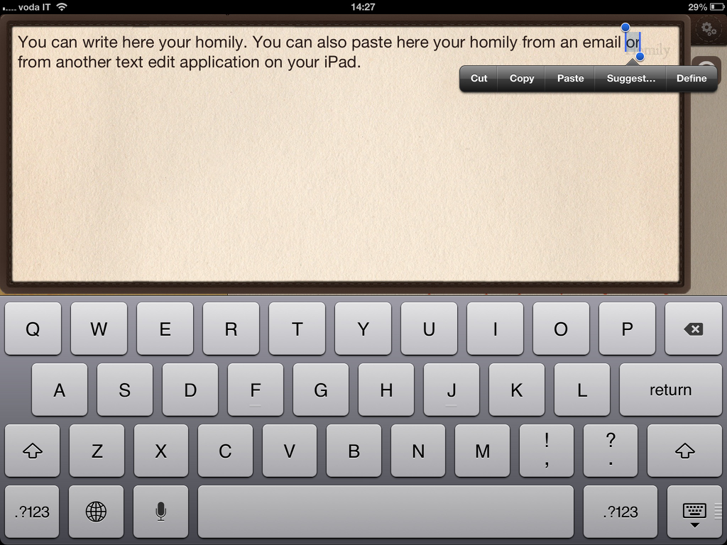 Interface of the iBreviary app showing the homily editor with an on-screen iPad keyboard and text editing tools.