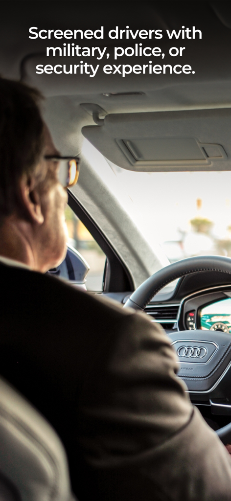 BlackWolf App - A professional BlackWolf driver with security experience behind the wheel of a luxury vehicle