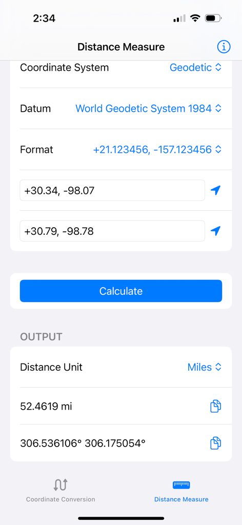 The distance measure interface of the Map Tools app displaying coordinate calculation between two points using the WGS84 datum