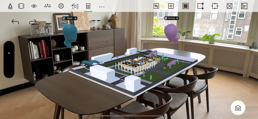 Arkio - Augmented reality view of a 3D architectural model on a table using Arkio with collaborative avatars
