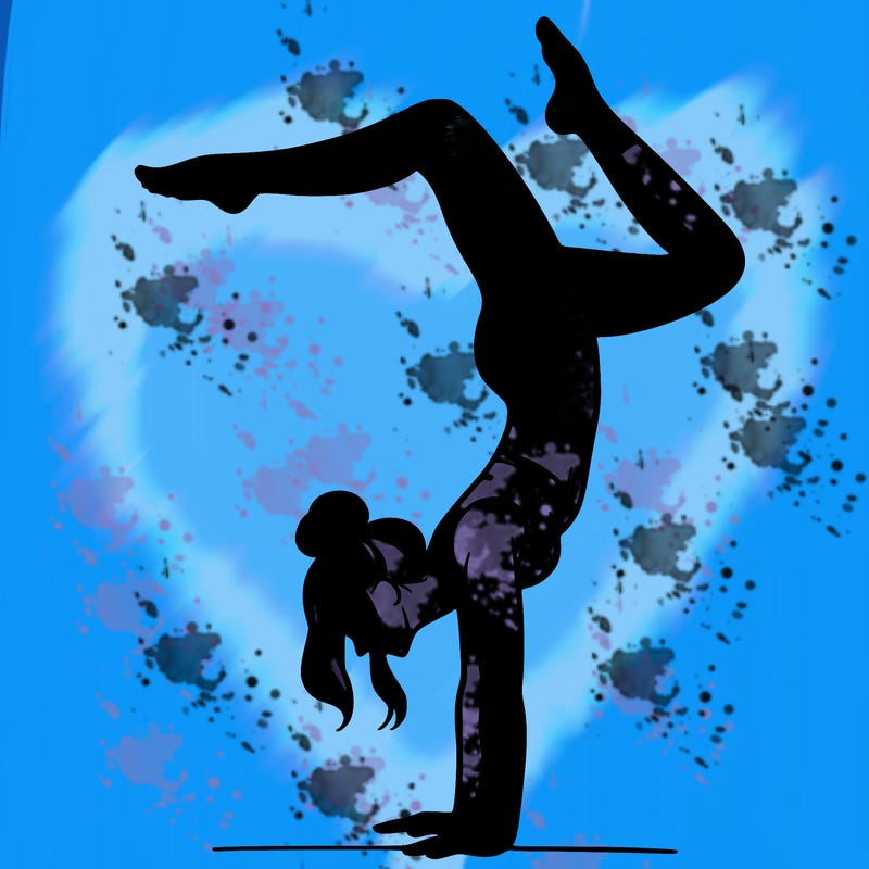 a woman doing a handstand