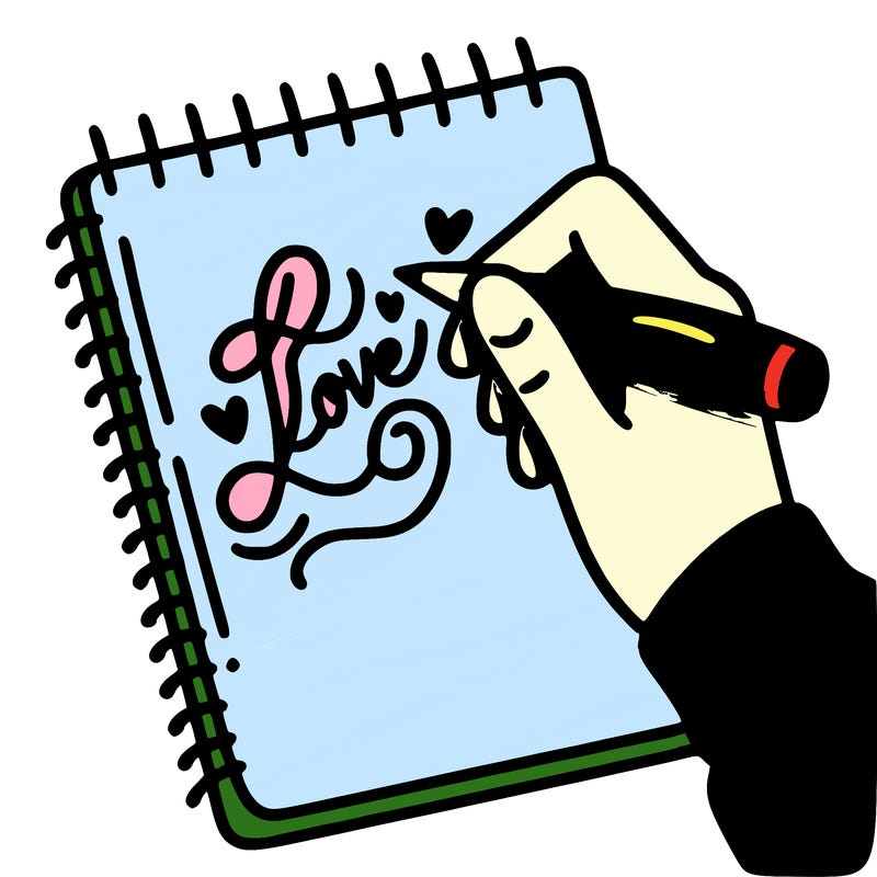 a hand writing “love” in calligraphy on a notebook