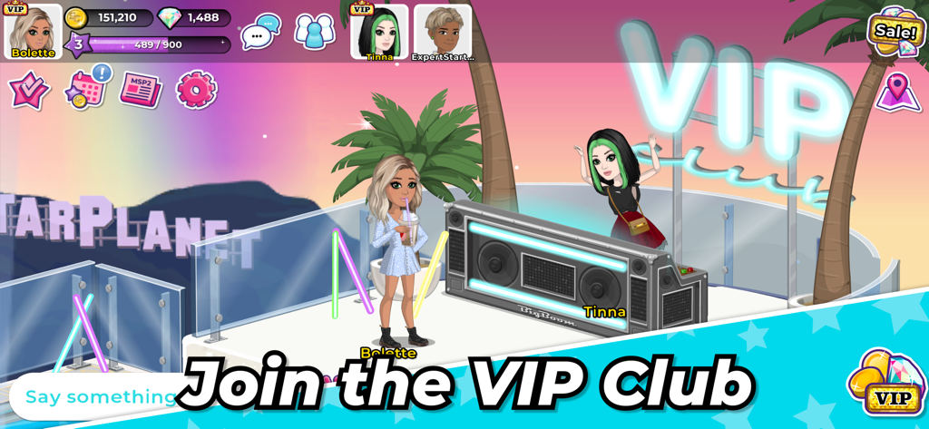 Two avatars socialising and dancing at the beach VIP Club in MovieStarPlanet 2