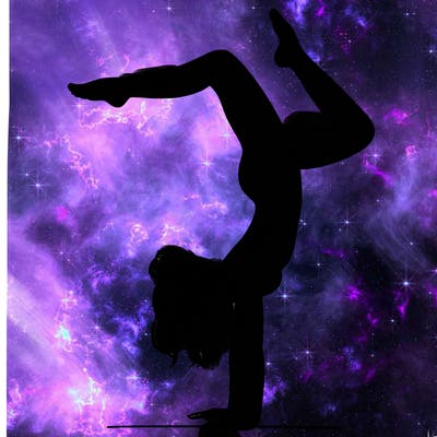 a woman doing a handstand